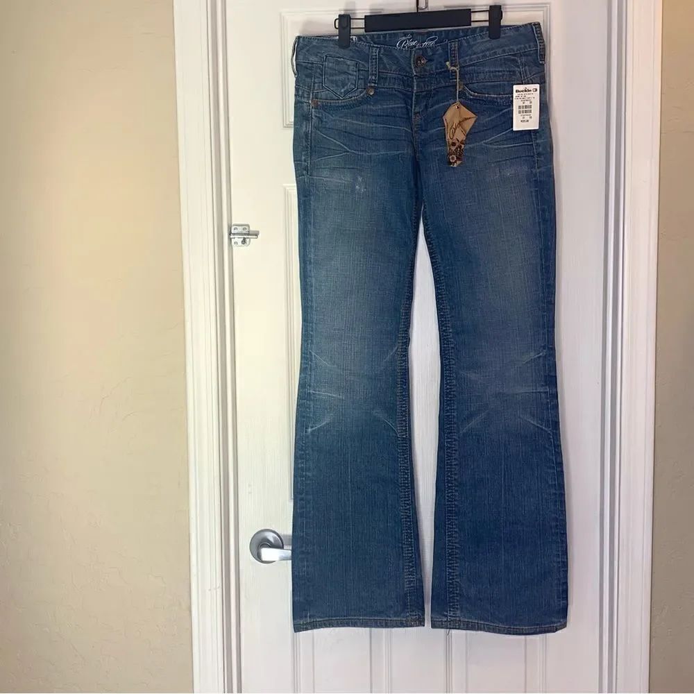 The Buckle Blue Tattoo Bell Bottom Blues Jeans Size 31